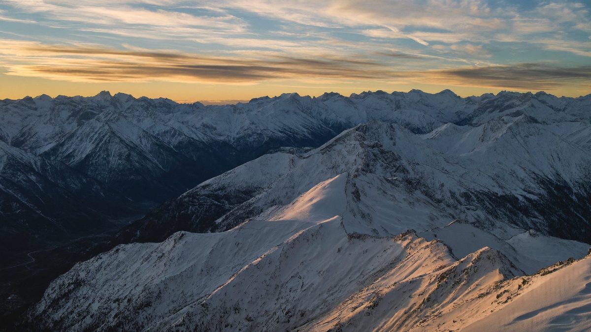 Moodboard: snowy mountain range at dawn